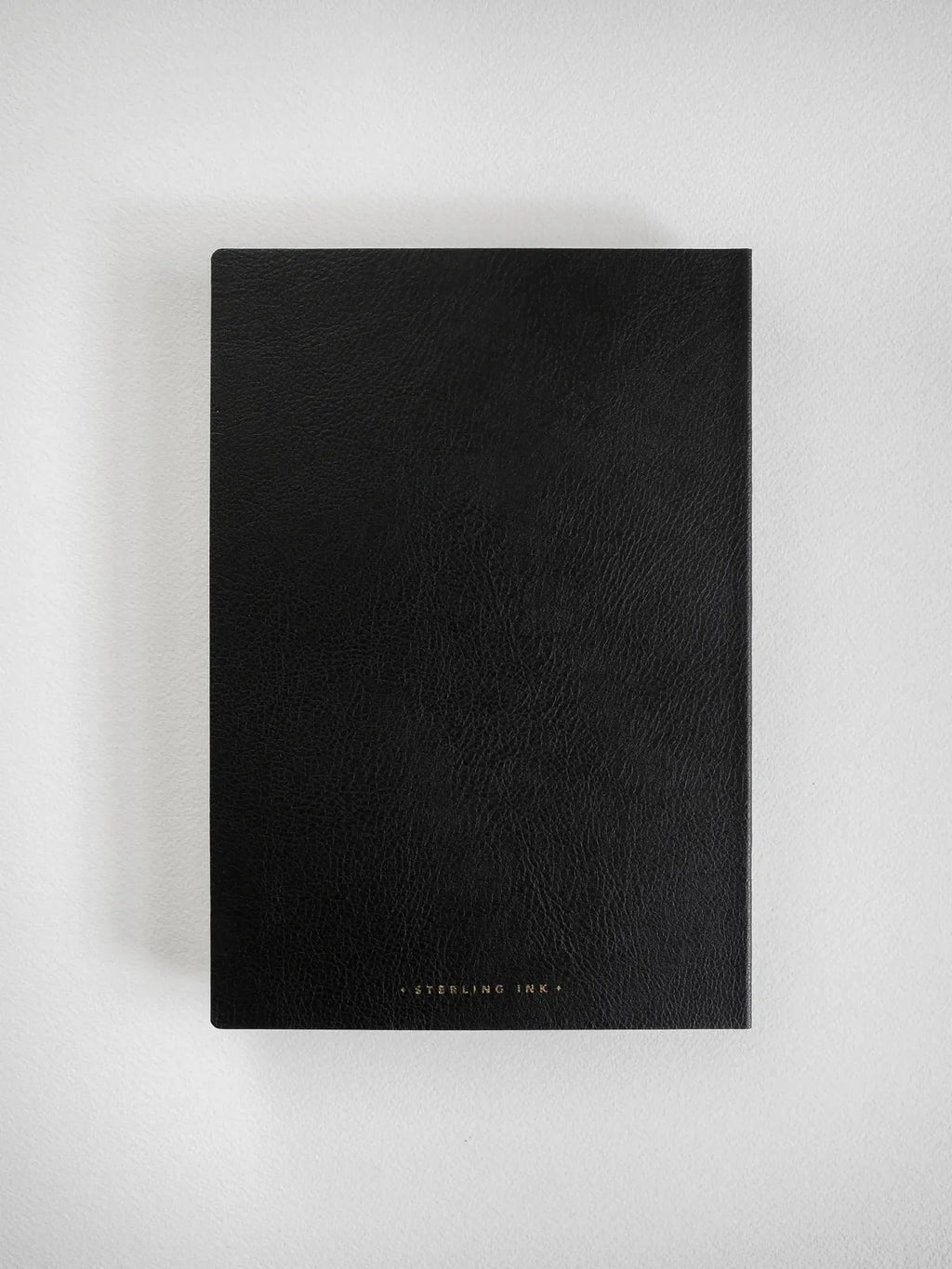 A5 Grid Notebook with 520 Numbered Pages and a Lay-Flat Design for Writing Across the Open Spread