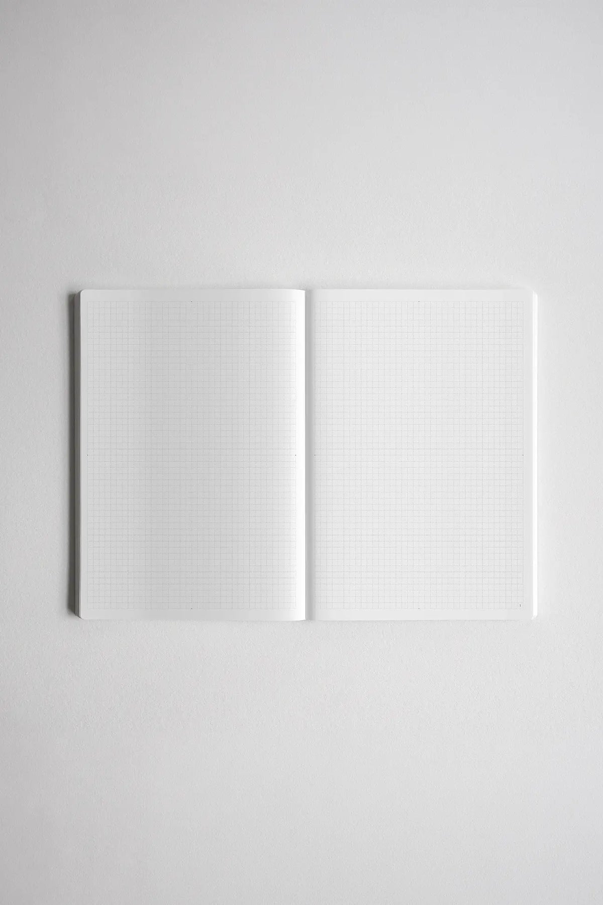 A5 Grid Notebook with 520 Numbered Pages and a Lay-Flat Design for Writing Across the Open Spread