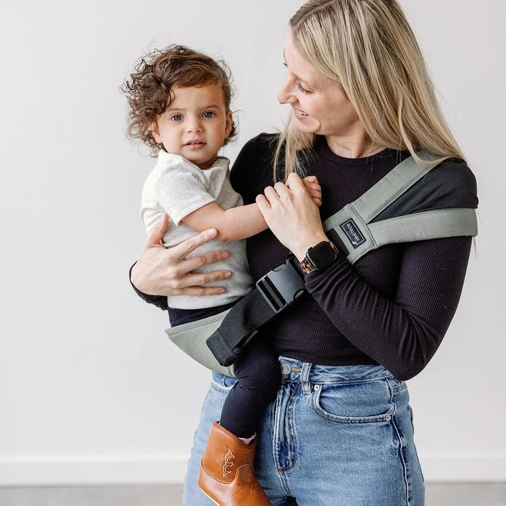 Baby Hip Carrier in Olive Cotton with an Ergonomic M-Position Seat and Included Travel Bag for Easy Packing