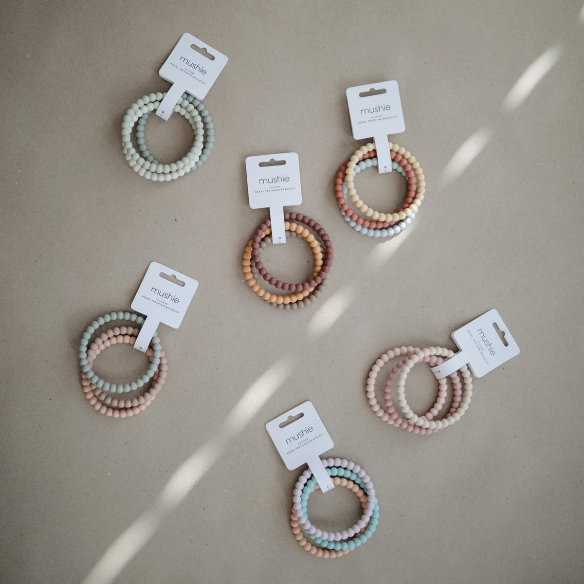 Baby Teether Bracelet in Food-Grade Silicone with Easy-Grasp Pearl Bead Design and Five Color Combinations