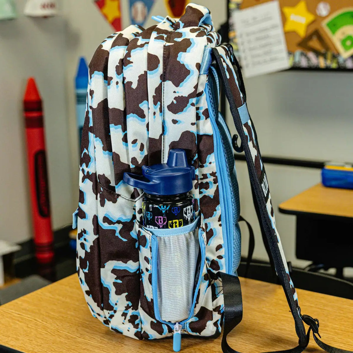 Baseball Backpack for School in Blue Cowhide Print with Expandable Bottle Pouches on Both Sides