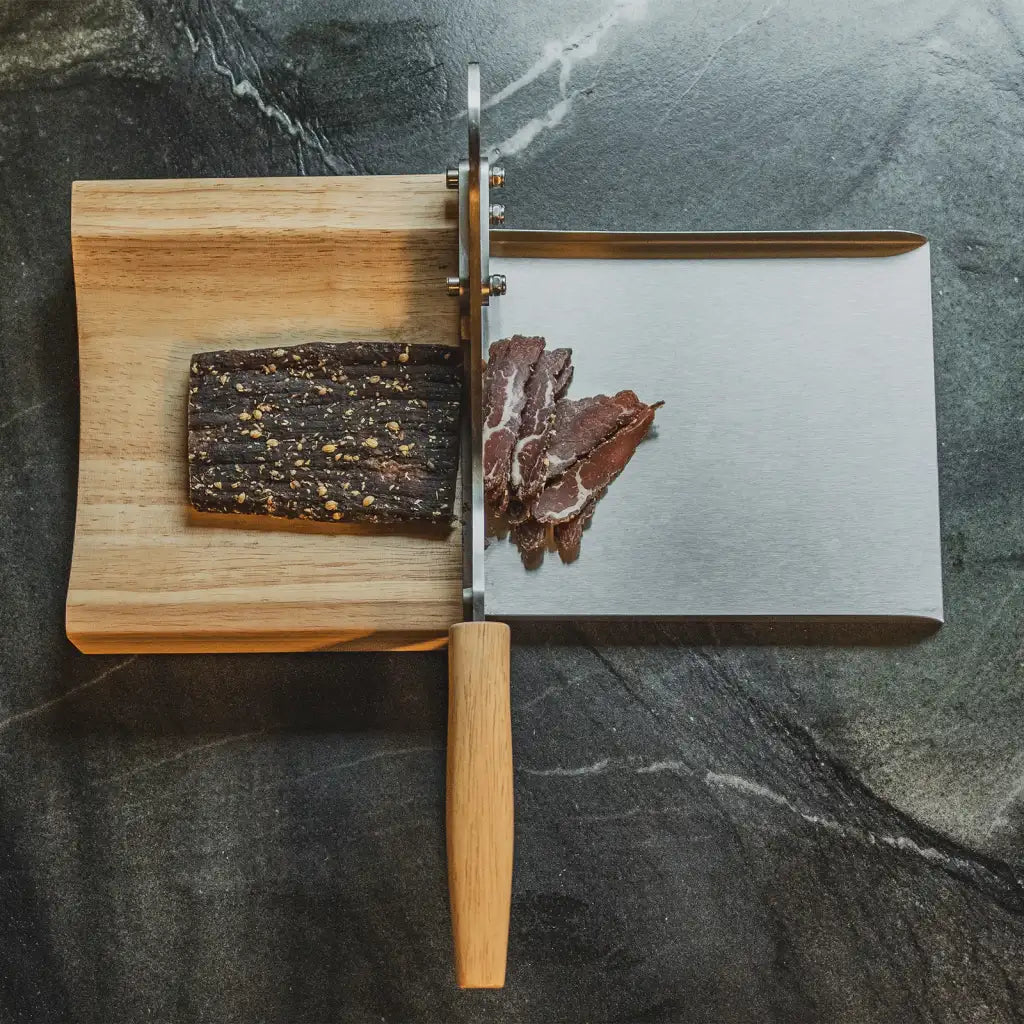 Biltong Cutter with Sharp Stainless Steel Blade, Solid Wood Base and Removable Magnetic Catch Pan
