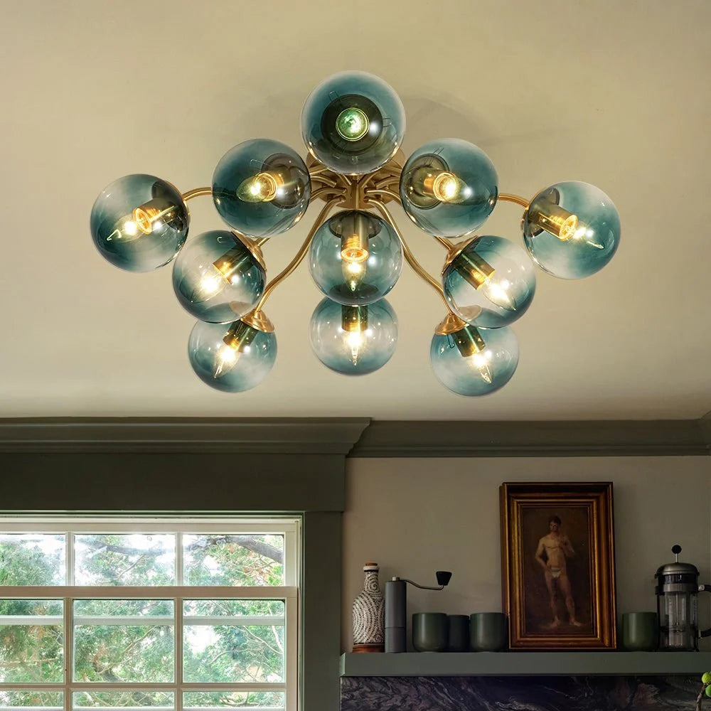 Blue Glass Bubble Semi Flush Chandelier with Gradient Globes and a Curved Brushed Brass Sputnik Frame
