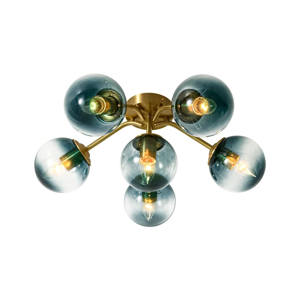 Blue Glass Bubble Semi Flush Chandelier with Gradient Globes and a Curved Brushed Brass Sputnik Frame
