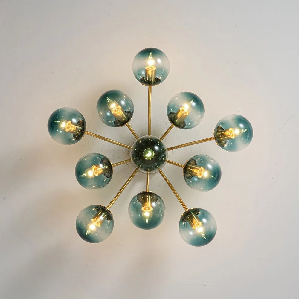 Blue Glass Bubble Semi Flush Chandelier with Gradient Globes and a Curved Brushed Brass Sputnik Frame