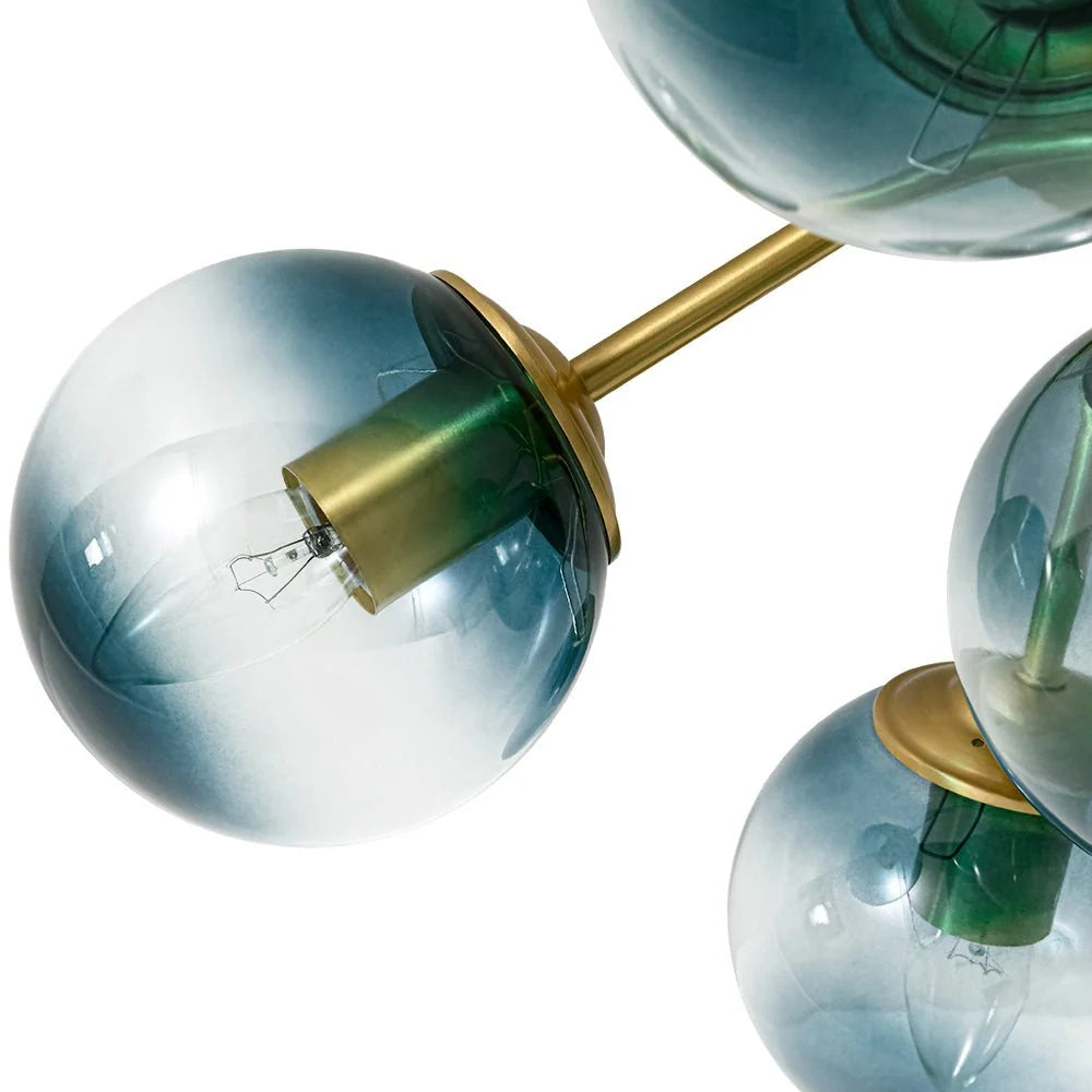 Blue Glass Bubble Semi Flush Chandelier with Gradient Globes and a Curved Brushed Brass Sputnik Frame