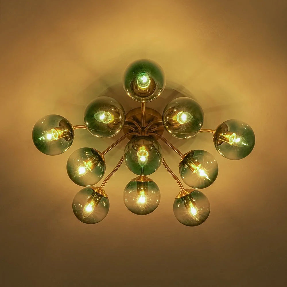 Blue Glass Bubble Semi Flush Chandelier with Gradient Globes and a Curved Brushed Brass Sputnik Frame