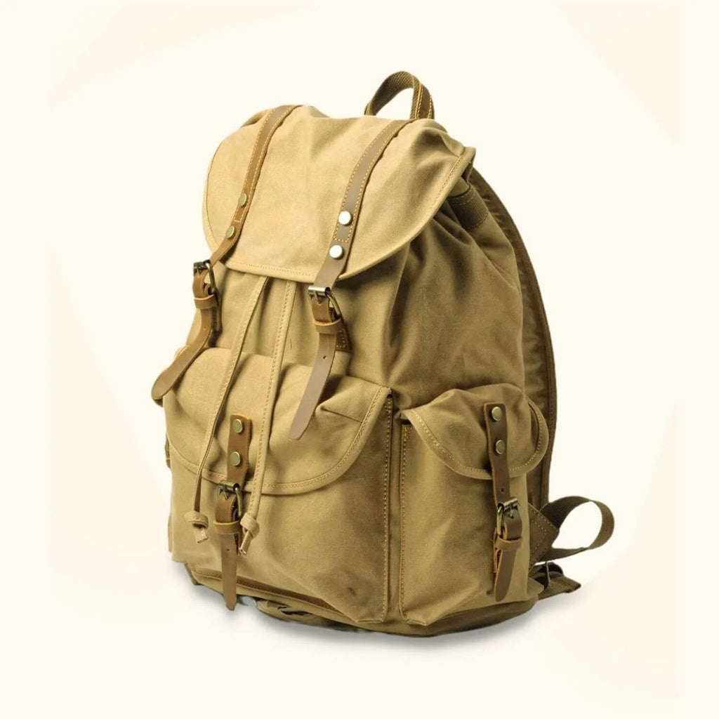 Canvas School Backpack with Full Grain Leather Accents and a 15.6-Inch Laptop Sleeve for Daily Use