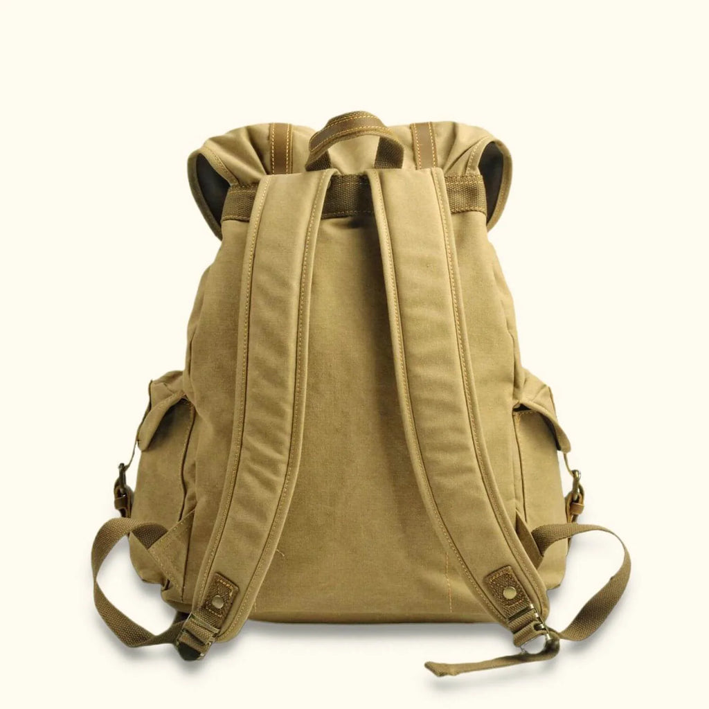Canvas School Backpack with Full Grain Leather Accents and a 15.6-Inch Laptop Sleeve for Daily Use