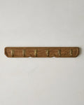 Carved Wood and Brass Hook Rack for Entryway Wall Organization of Coats, Hats, and Bags · Carved wood details