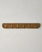 Carved Wood and Brass Hook Rack for Entryway Wall Organization of Coats, Hats, and Bags · Carved wood details