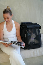 Cat Carrier Backpack with Technical Performance Materials and a Design Centered on Feline Curiosity