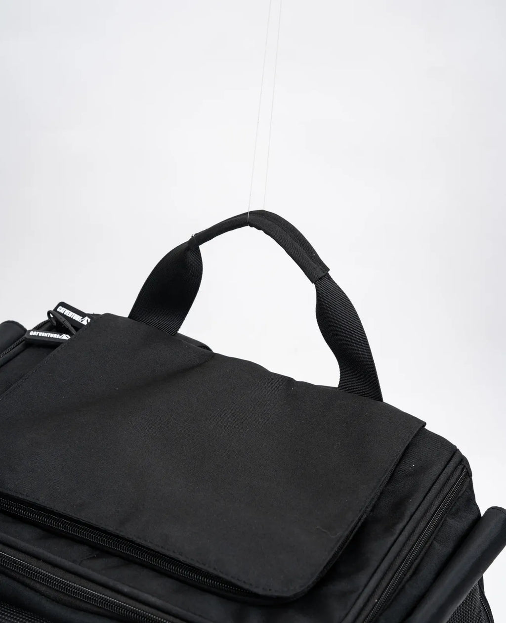 Cat Carrier Backpack with Technical Performance Materials and a Design Centered on Feline Curiosity