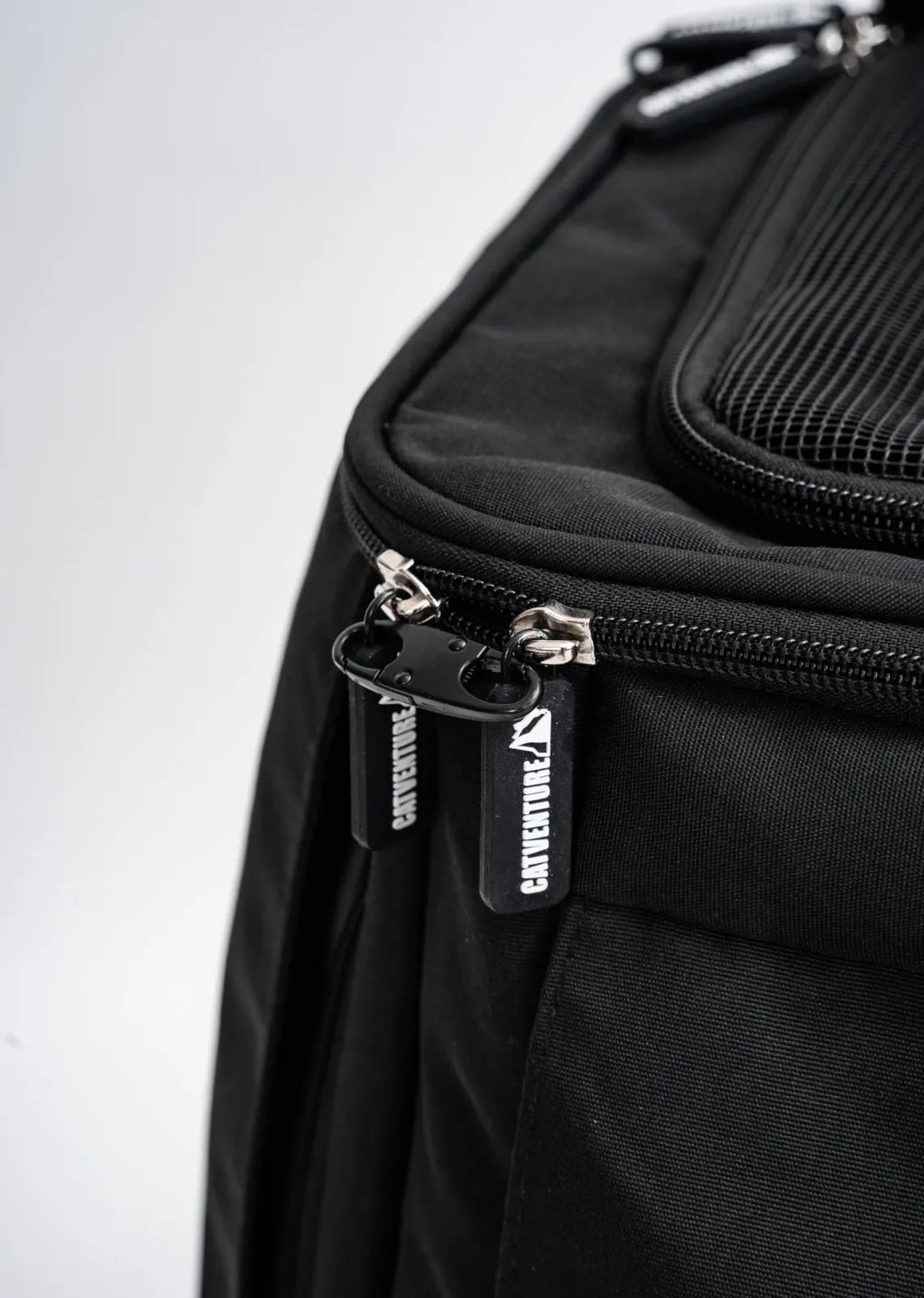 Cat Carrier Backpack with Technical Performance Materials and a Design Centered on Feline Curiosity