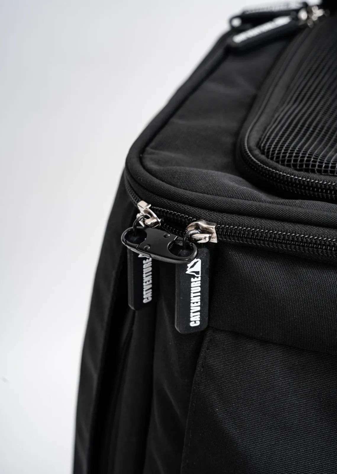 Cat Carrier Backpack with Technical Performance Materials and a Design Centered on Feline Curiosity