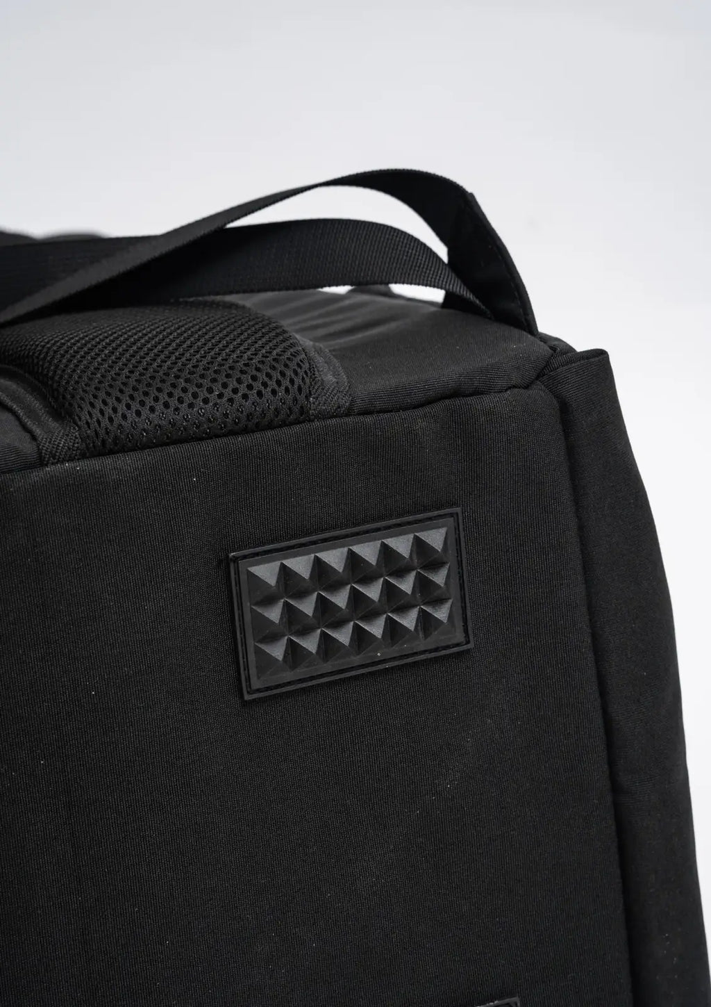 Cat Carrier Backpack with Technical Performance Materials and a Design Centered on Feline Curiosity