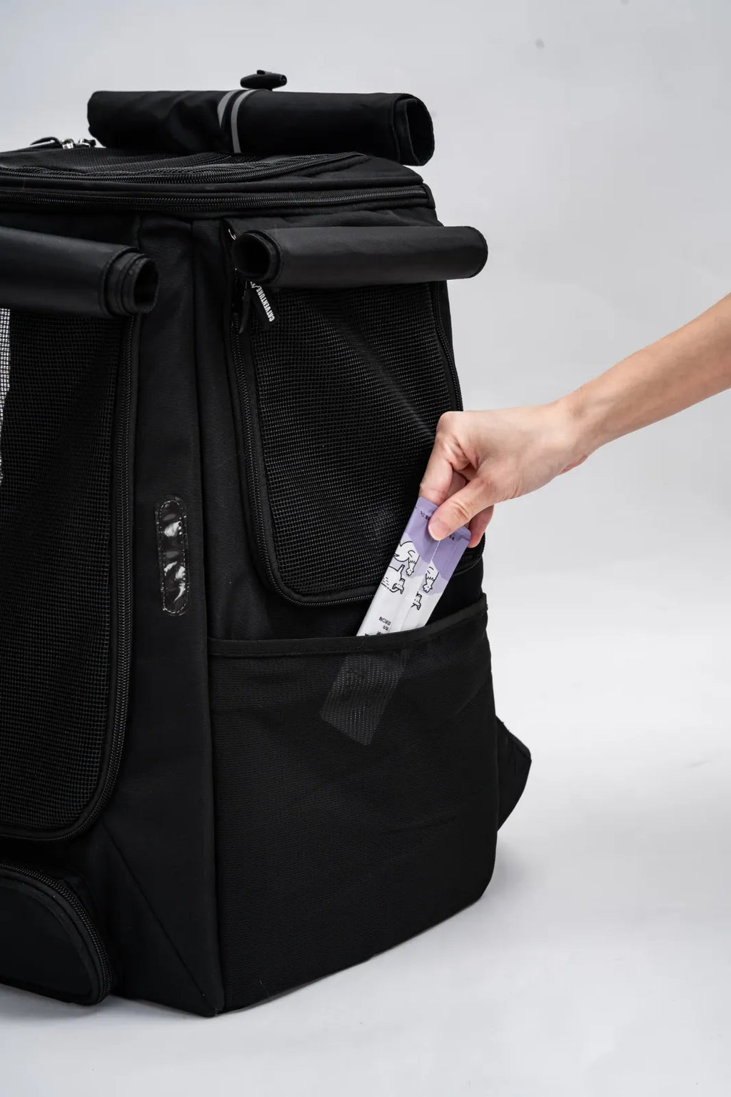 Cat Carrier Backpack with Technical Performance Materials and a Design Centered on Feline Curiosity