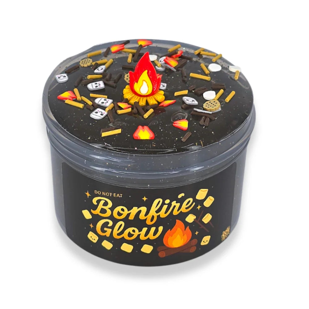 Clear Slime in a 7oz Bonfire Theme with Golden Glitter, Flame Charm and a Light Musk-Mahogany Scent