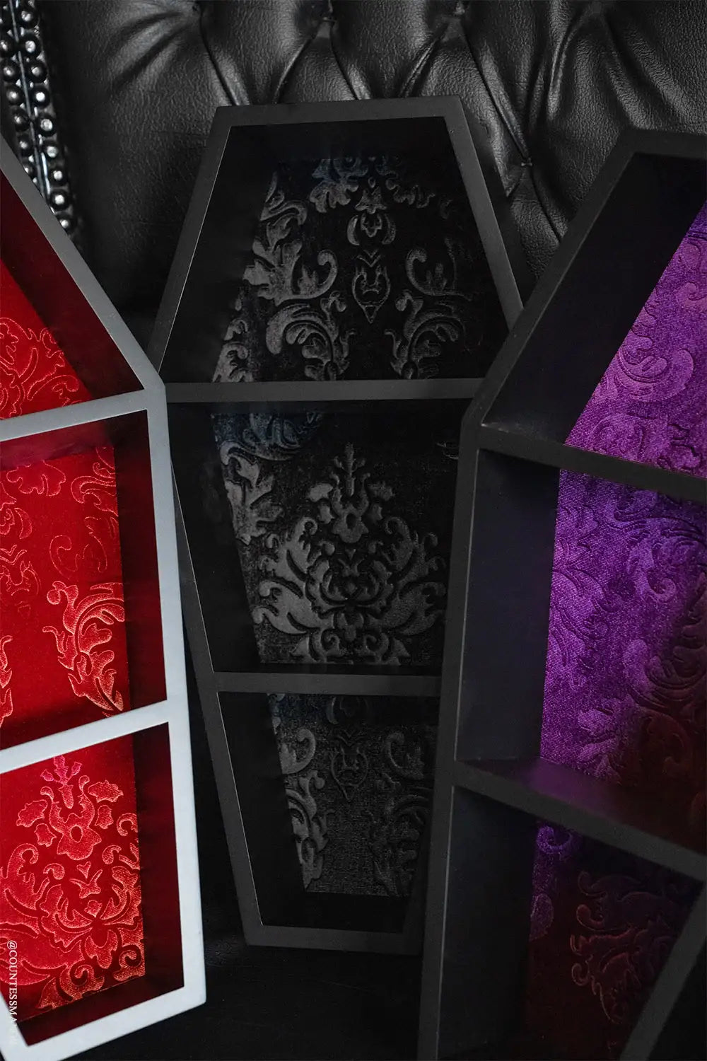 Coffin Wall Shelf with Embossed Velvet Damask Backing and Three Display Tiers in a Matte Black Finish