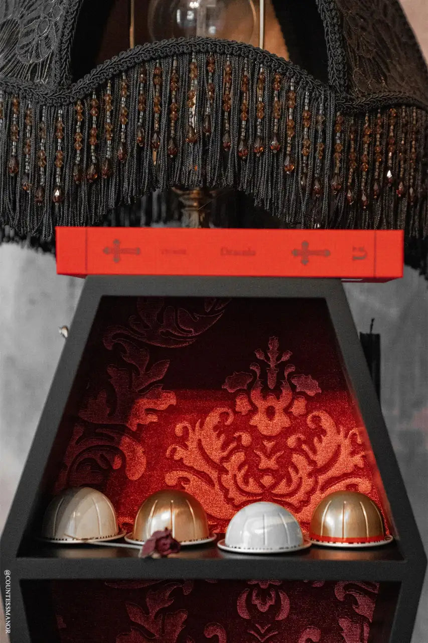 Coffin Wall Shelf with Embossed Velvet Damask Backing and Three Display Tiers in a Matte Black Finish