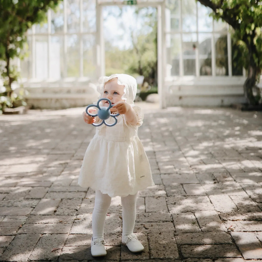 Daisy Rattle Teether with Textured Silicone and Easy-Grasp Handles for Baby Teething and Play