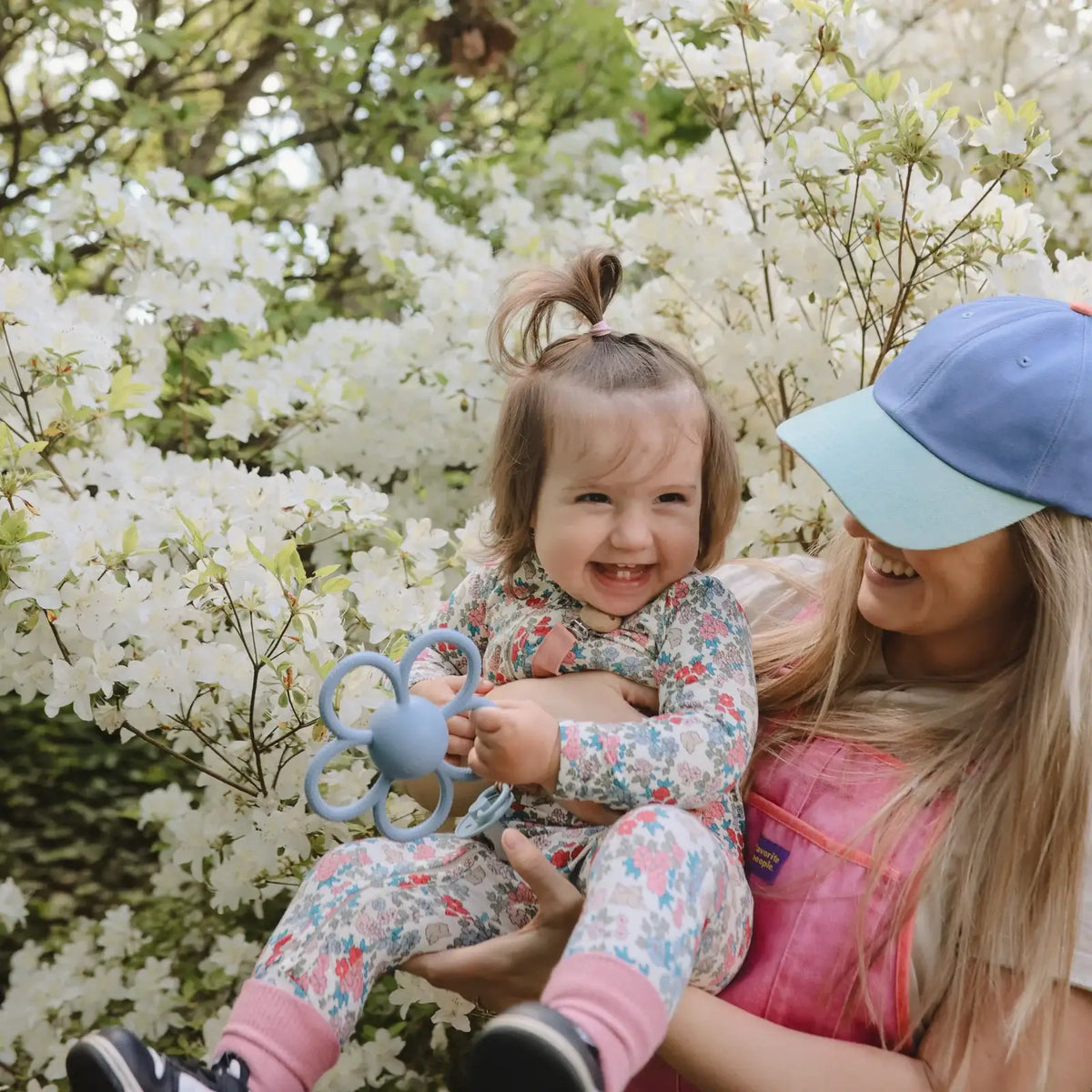 Daisy Rattle Teether with Textured Silicone and Easy-Grasp Handles for Baby Teething and Play