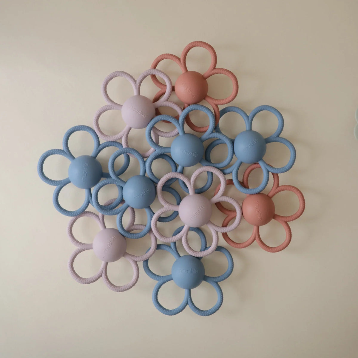 Daisy Rattle Teether with Textured Silicone and Easy-Grasp Handles for Baby Teething and Play