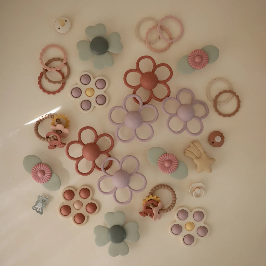 Daisy Rattle Teether with Textured Silicone and Easy-Grasp Handles for Baby Teething and Play