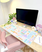 Desk Mat in a Pastel Small World Theme with a Smooth Neoprene Surface and Non-Slip Rubber Backing