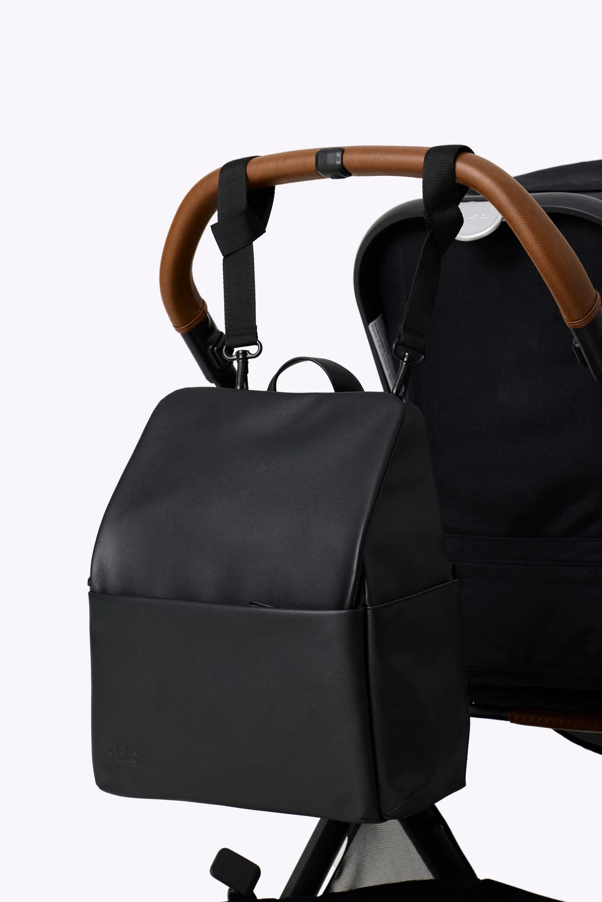 Diaper Backpack in Black Vegan Leather with a Magnetic Wipes Pocket and Removable Stroller Straps