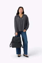 Diaper Backpack in Black Vegan Leather with a Magnetic Wipes Pocket and Removable Stroller Straps