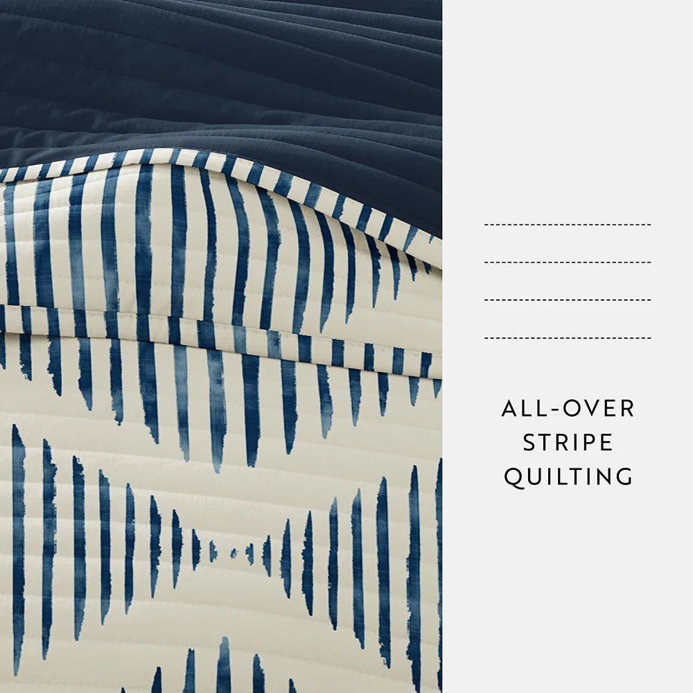 Distressed Diamond Reversible Quilted Coverlet Set in Navy