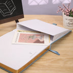Dot Grid Notebook in Blue with a Gold-Stamped Vintage Buckram Cover and 160 Numbered Pages for Journaling