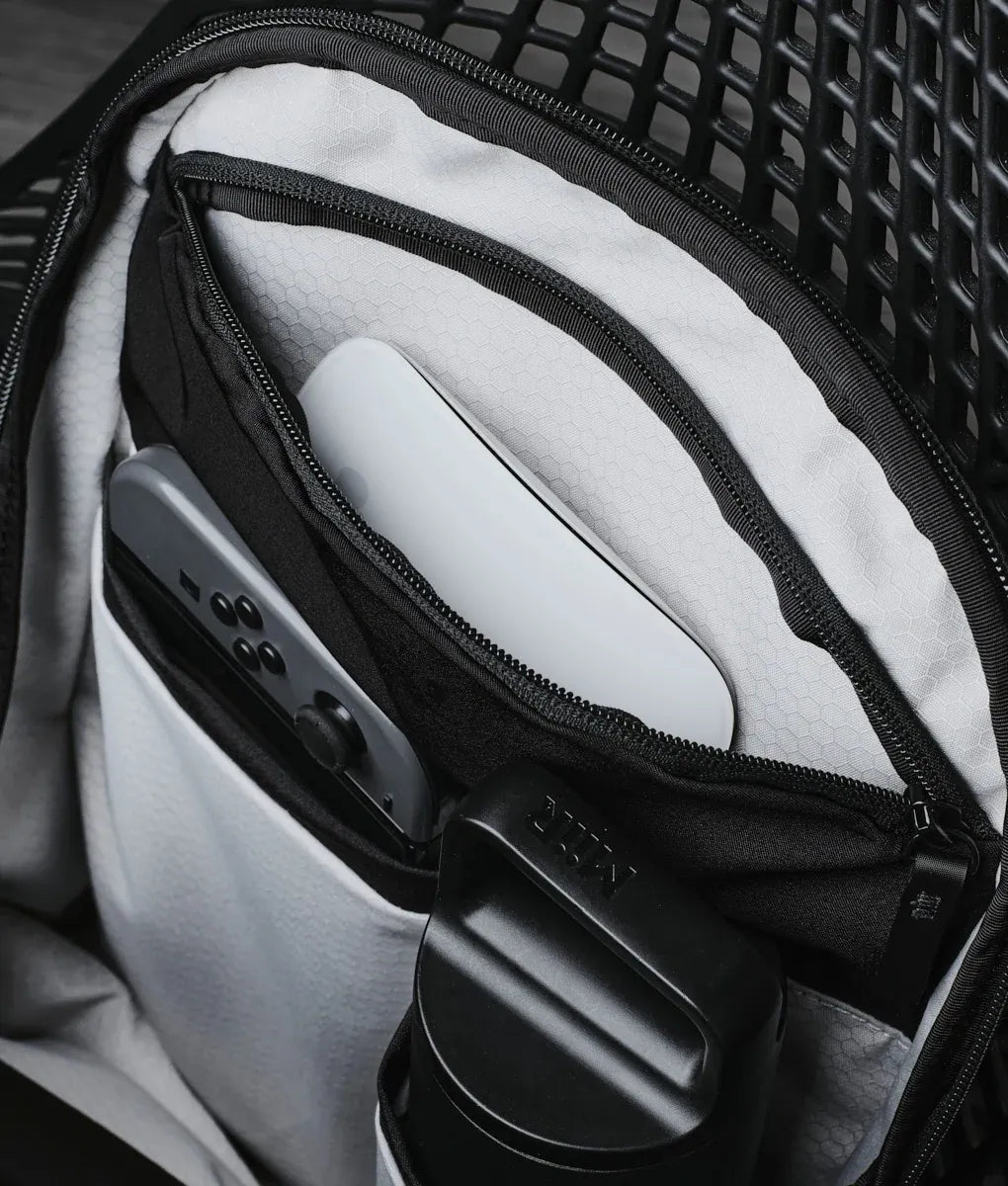 Everyday Backpack with 12L Capacity and Two Zippered Main Compartments for School and Town Errands