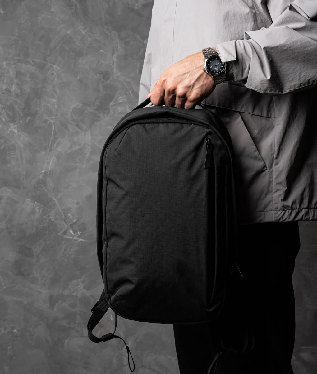 Everyday Backpack with 12L Capacity and Two Zippered Main Compartments for School and Town Errands