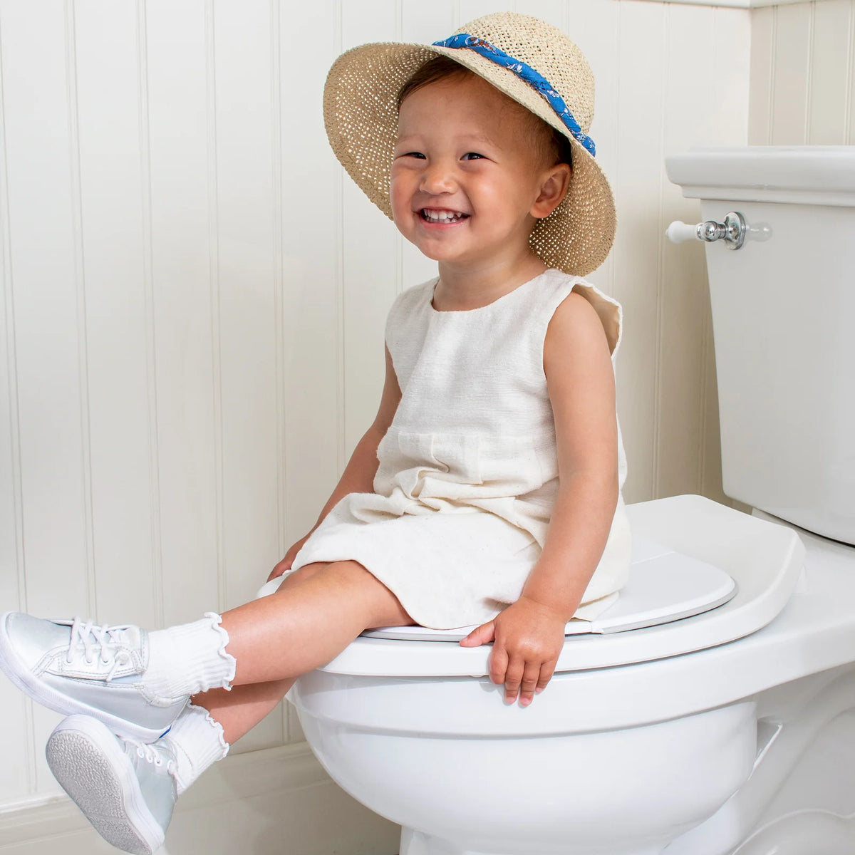 Folding Toddler Potty Seat for Travel with Non-Slip Liner, Locking Hinges and Machine-Washable Carry Bag