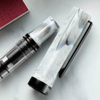 Fountain Pen with Crystal Clear Piston Barrel, Carrara Marbled Pattern and Five Nib Sizes for Everyday Writing
