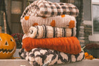 Ghost Print Blanket in Rich Brown and Tan, Soft Stretchy Plush for Cozy Halloween Evenings at Home