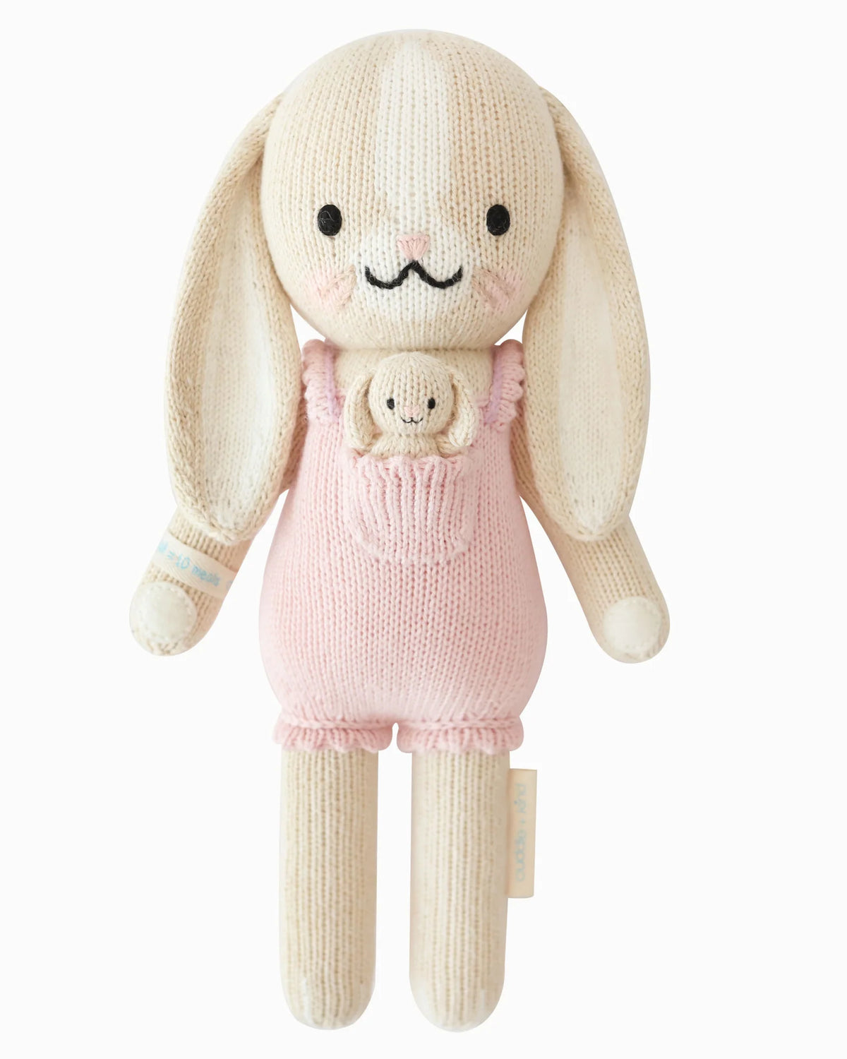 Hand Knit Bunny Doll in Peony Pink, 13-Inch Cotton Toy with Soft Details and a 10-Meal Giving Wristband
