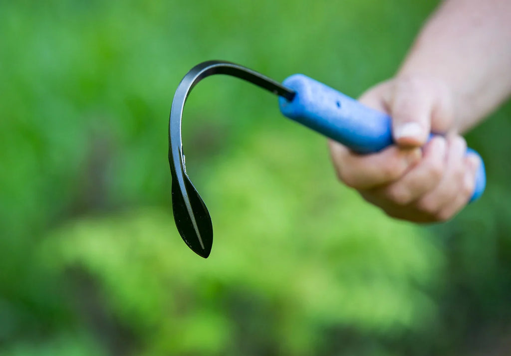 Hand Weeder and Cultivator with a Slender Blade for Working Between Vegetable Rows and in Walkway Cracks