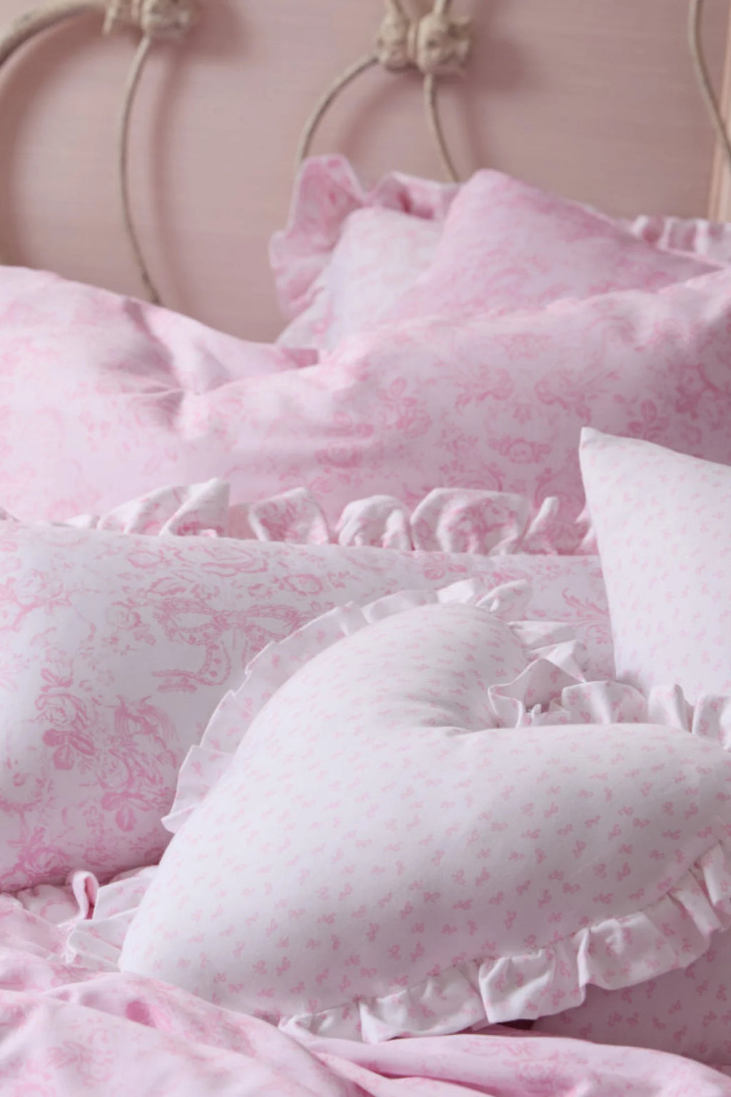 Heart Shape Ruffle Pillow with Removable Insert and Zipper Closure in Floral Print Color · heart pillow