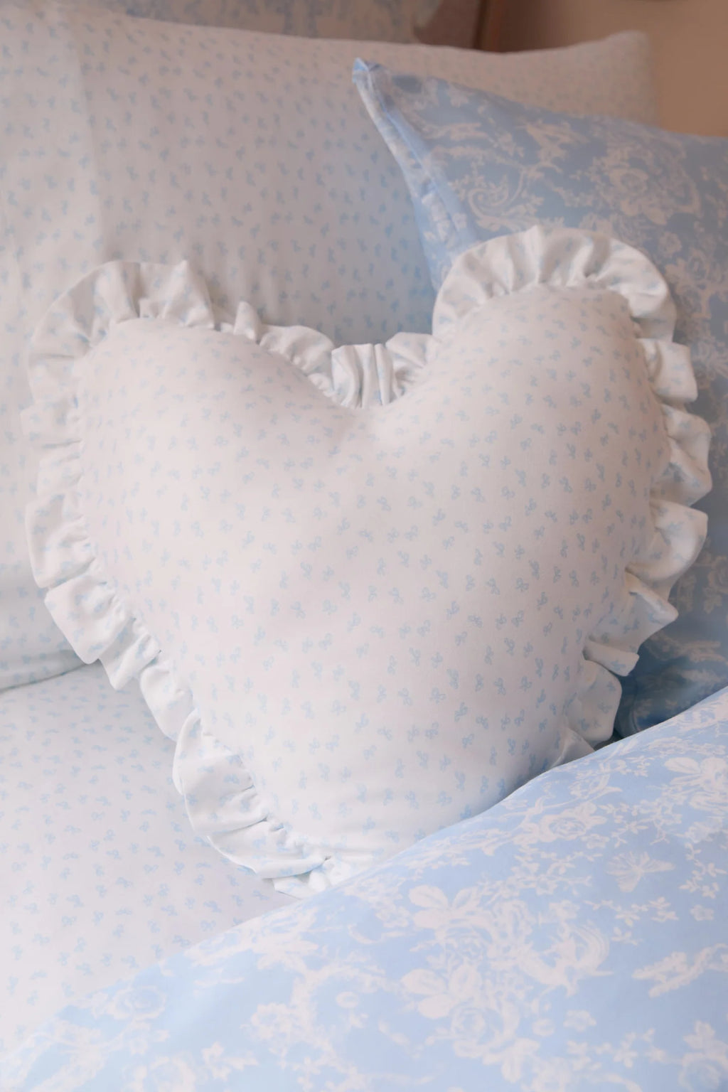 Heart Shape Ruffle Pillow with Removable Insert and Zipper Closure in Floral Print Color · heart pillow
