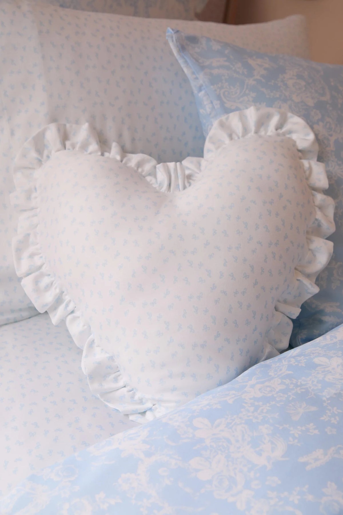 Heart Shape Ruffle Pillow with Removable Insert and Zipper Closure in Floral Print Color · heart pillow
