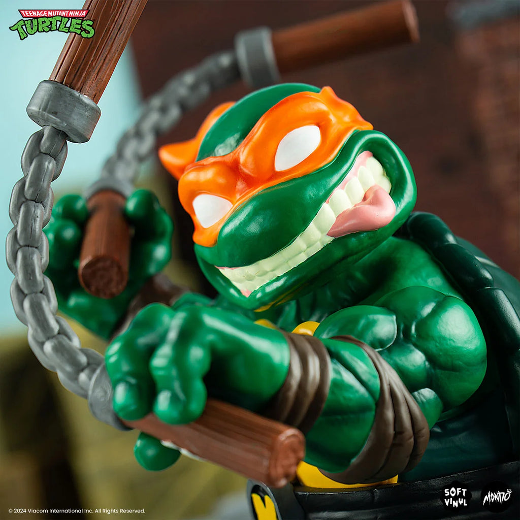 Michelangelo Soft Vinyl Action Figure with Bendable Poseable Nunchaku for Display · Michelangelo character figure
