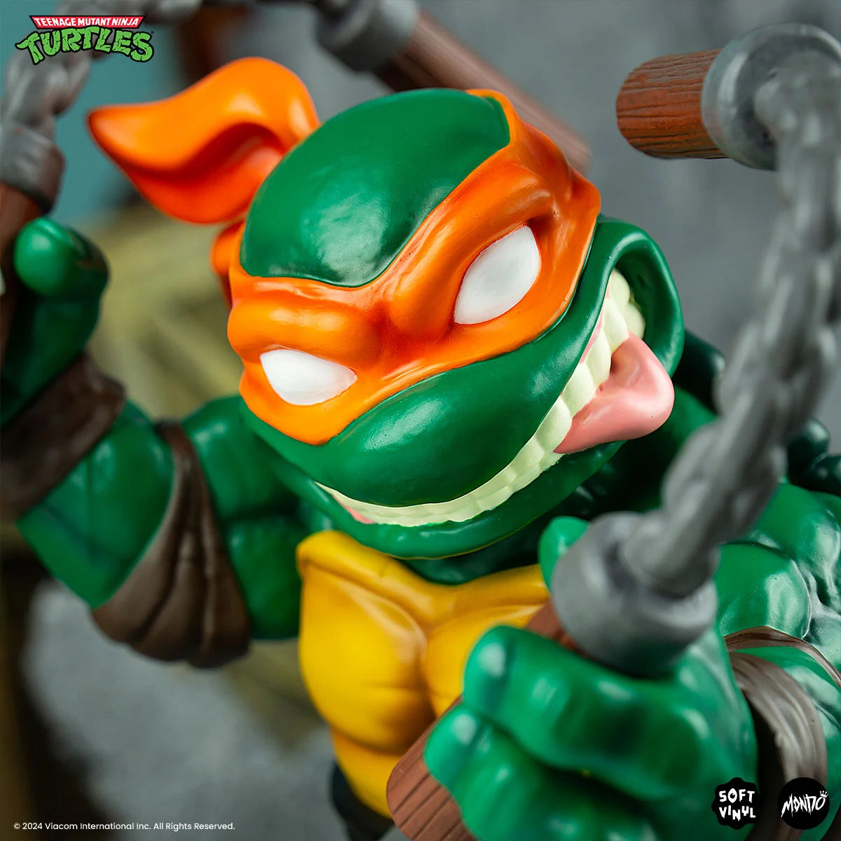 Michelangelo Soft Vinyl Action Figure with Bendable Poseable Nunchaku for Display · Michelangelo character figure