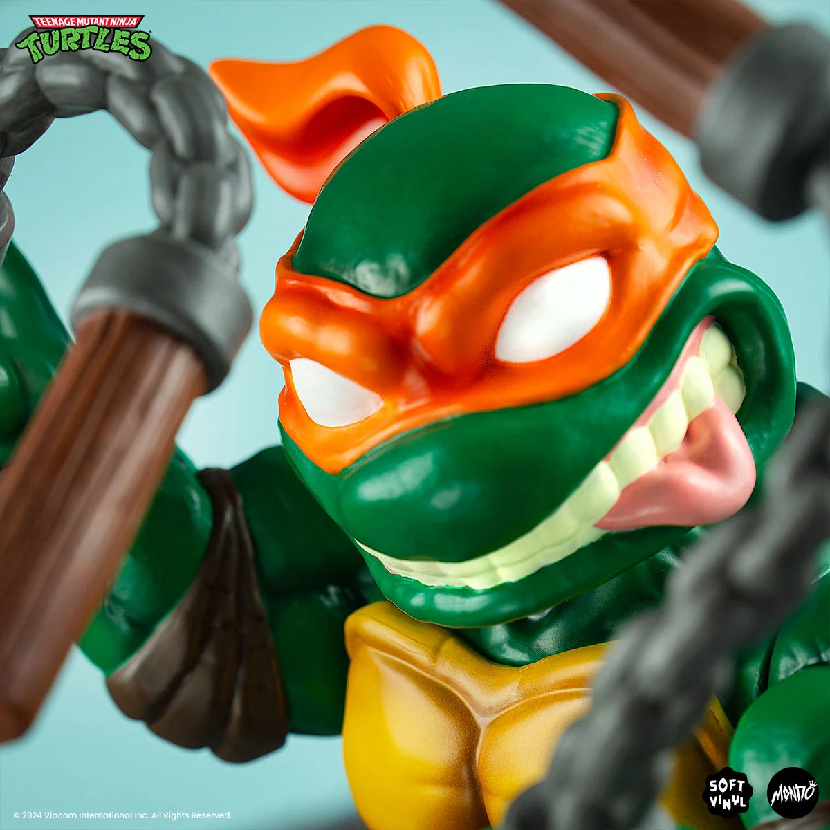Michelangelo Soft Vinyl Action Figure with Bendable Poseable Nunchaku for Display · Michelangelo character figure