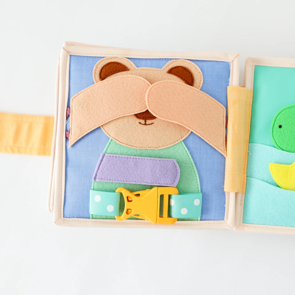 Mini Busy Book for Practical Skills and Imaginative Play with Three Dinosaur Finger Puppets