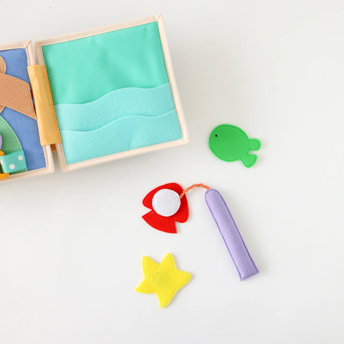 Mini Busy Book for Practical Skills and Imaginative Play with Three Dinosaur Finger Puppets