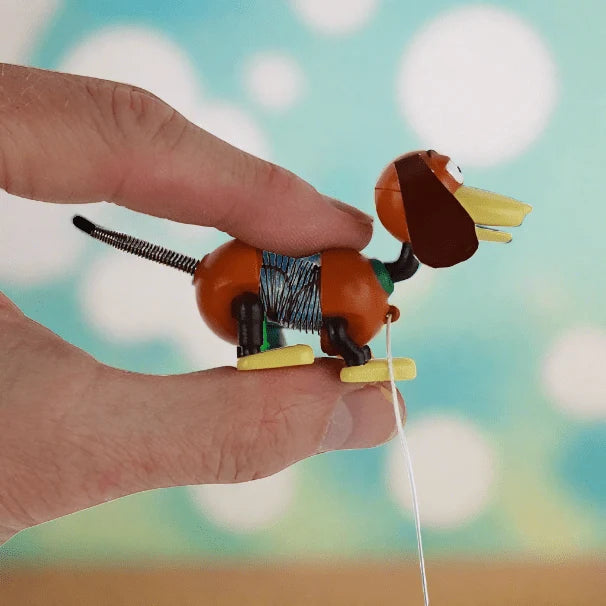 Miniature Spring Dog Pull Toy with an Accordion Body and Moving Ears, Collector’s Edition for Ages 6+