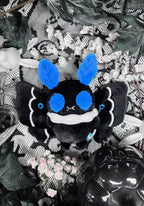 Mothman Plush Keychain Blind Box with Random Cryptid Design and Collectible Card · Random Mothman plush keychain design